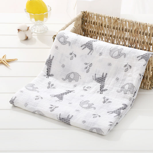 Baby blanket with animal pattern on a white surface